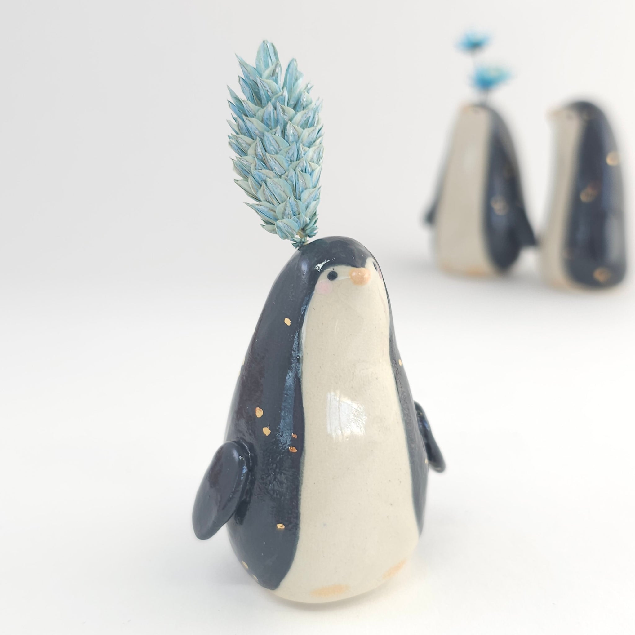 Flower Penguin – The Pottery Parade